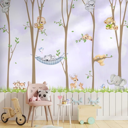 Forest animal wallpaper installed in a kids room featuring woodland animals and trees